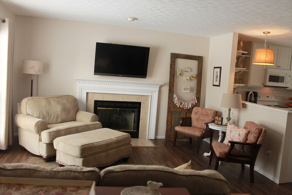 Living area with working gas fireplace.