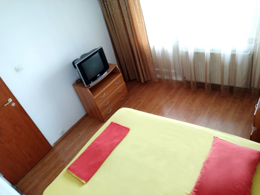 Bed room with one Double bed, Drawer for stuff and TV