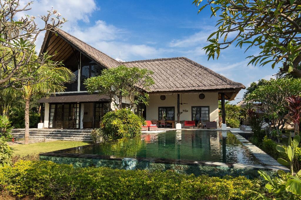 The front of the property with infinity pool