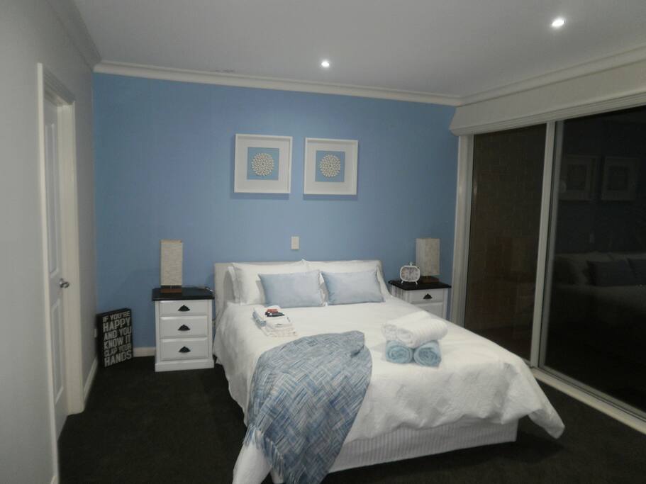 The master bedroom has its own private balcony with ocean views and features an ensuite with spa bath and WIR.
