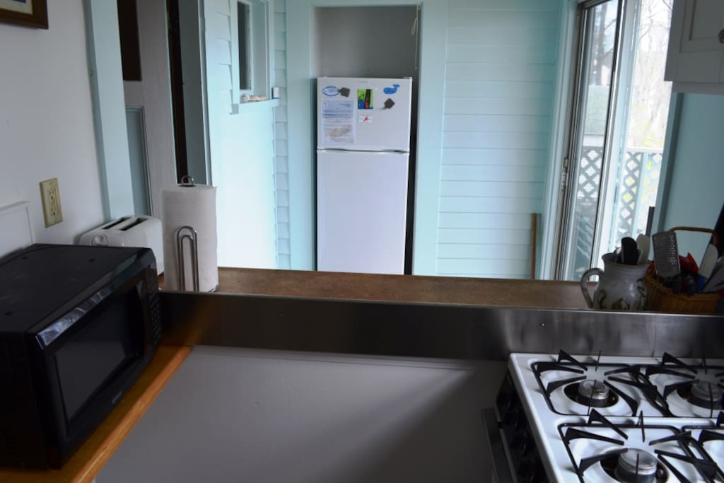 Sea Vagabond Cottage-Kitchen featuring breakfast bar with seats for 4