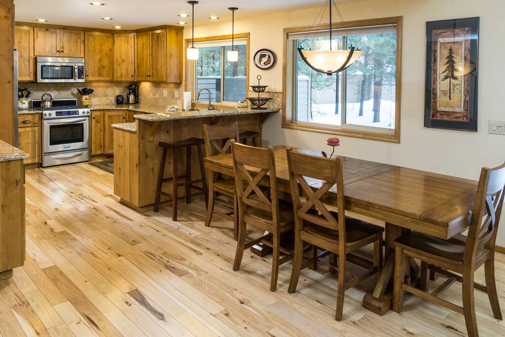 Seating for 8 at the table and an additional 2 at the bar.