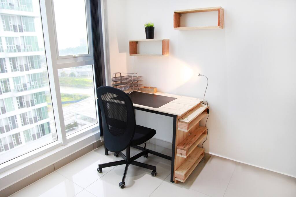 Personal workspace right beside the window with good view.