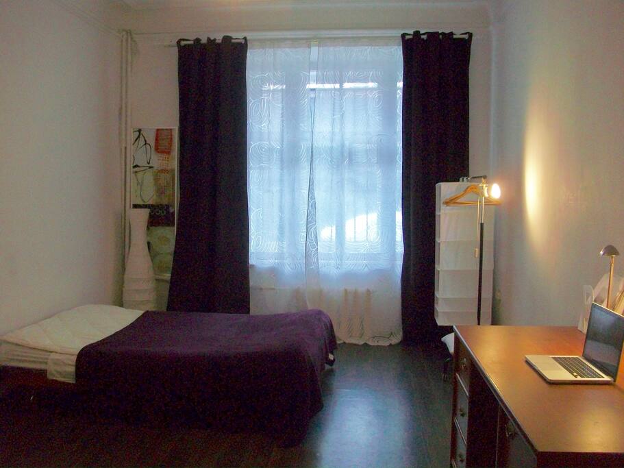 A huge airy room with a big window and big table very comfy, fits to any needs.
