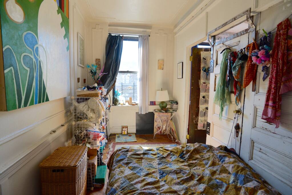 Bedroom is also filled with art.