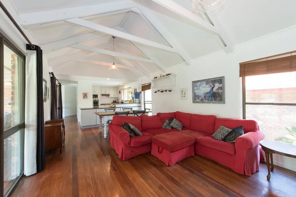 open plan lounge room, kitchen and dining