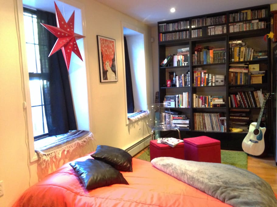 The couch/futon can be folded down into a bed between twin and full size.