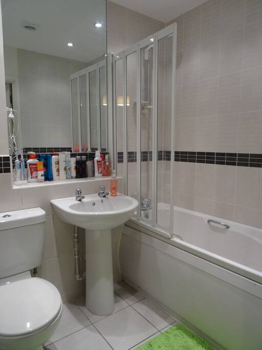 Well presented toilet. Clean and fresh wall and tiles.