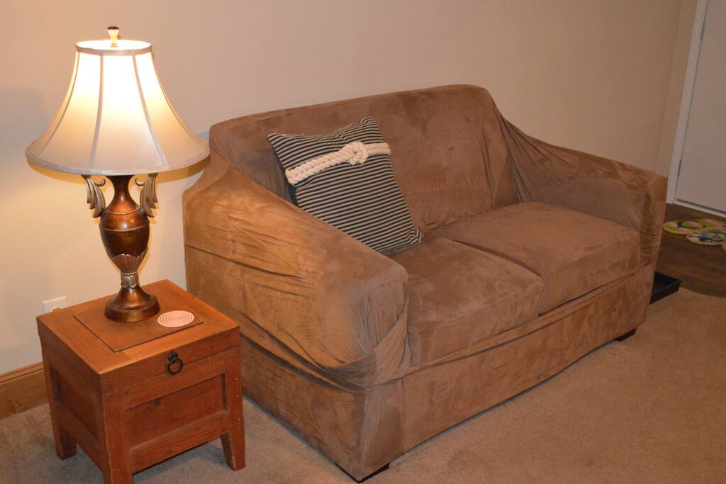 Love seat in living area