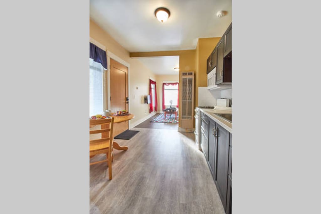Full kitchen - range, microwave, refrigerator.
