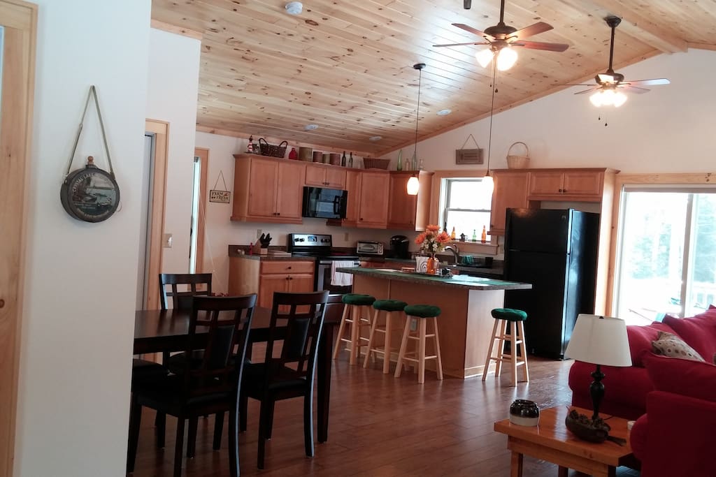 Full Kitchen with island and dining area.