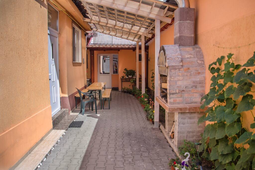 Courtyard with grill/barbecue and smoking place.