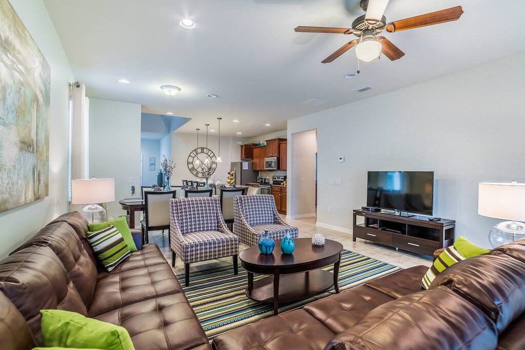 Open spacious living room with flat screen TV