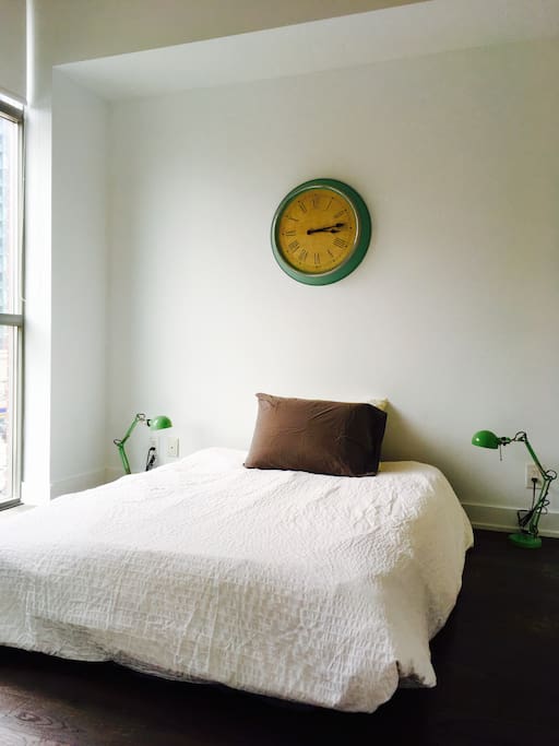 Double bed with pillow top mattress. Room has black-out drapes