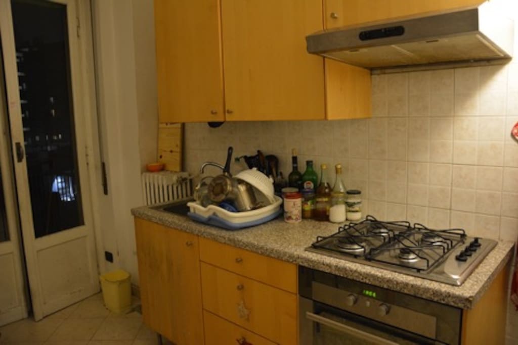 Kitchen. The door gives on to a small terrace
