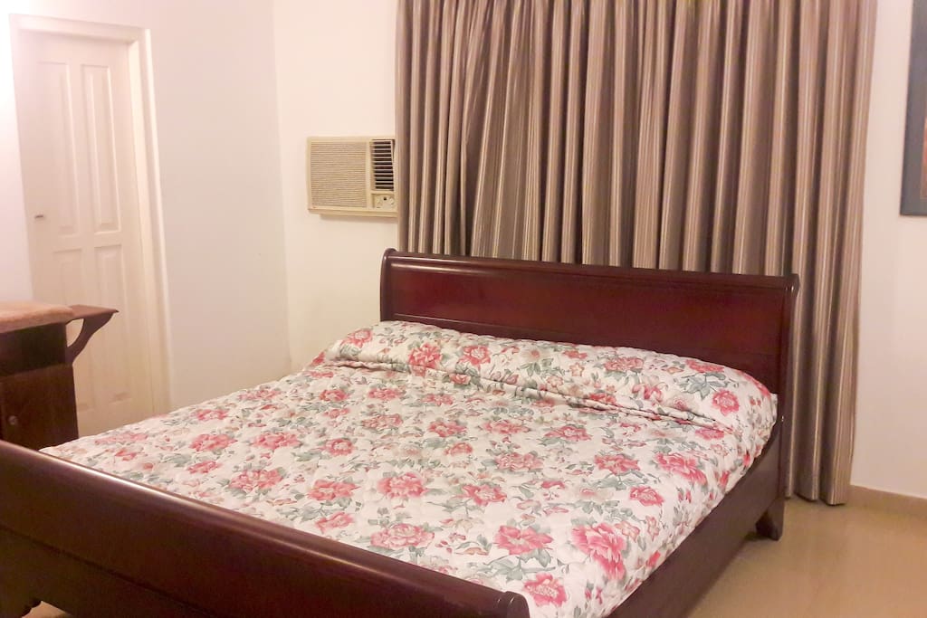 Fully Air-conditioned Room with Double Bed, Ironing Table and Cupboards
