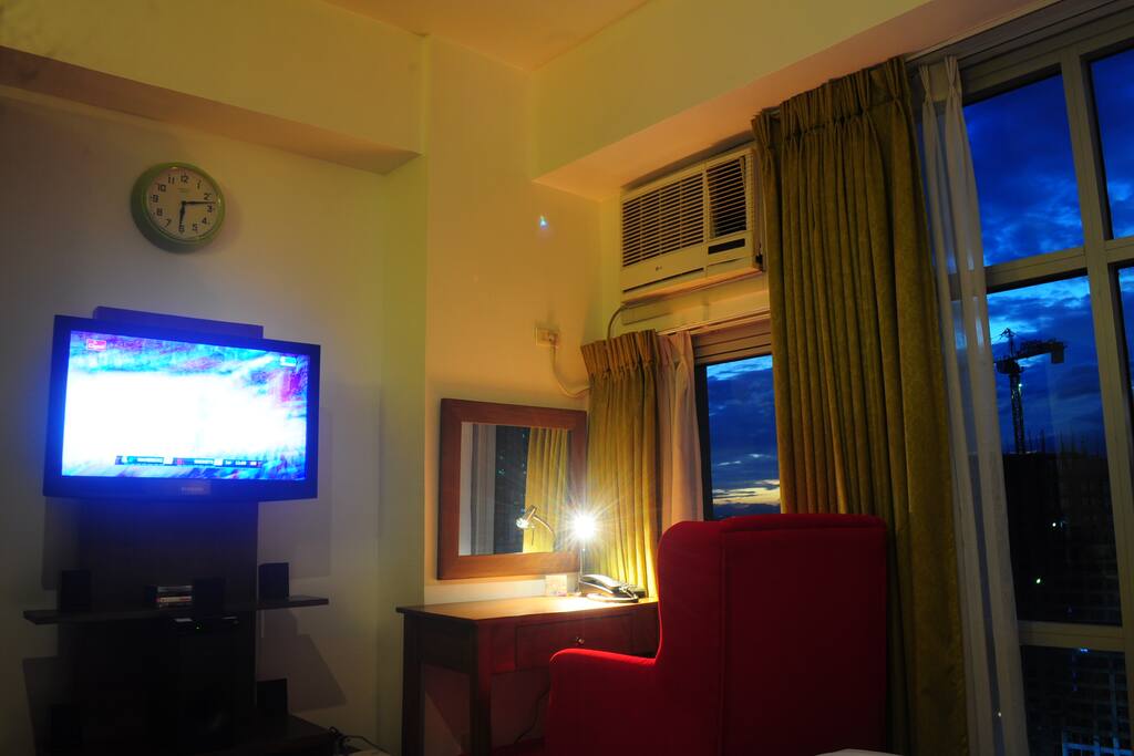 Home theater system with cable TV. Landline for local calls and DSL wi-fi internet. Study table.