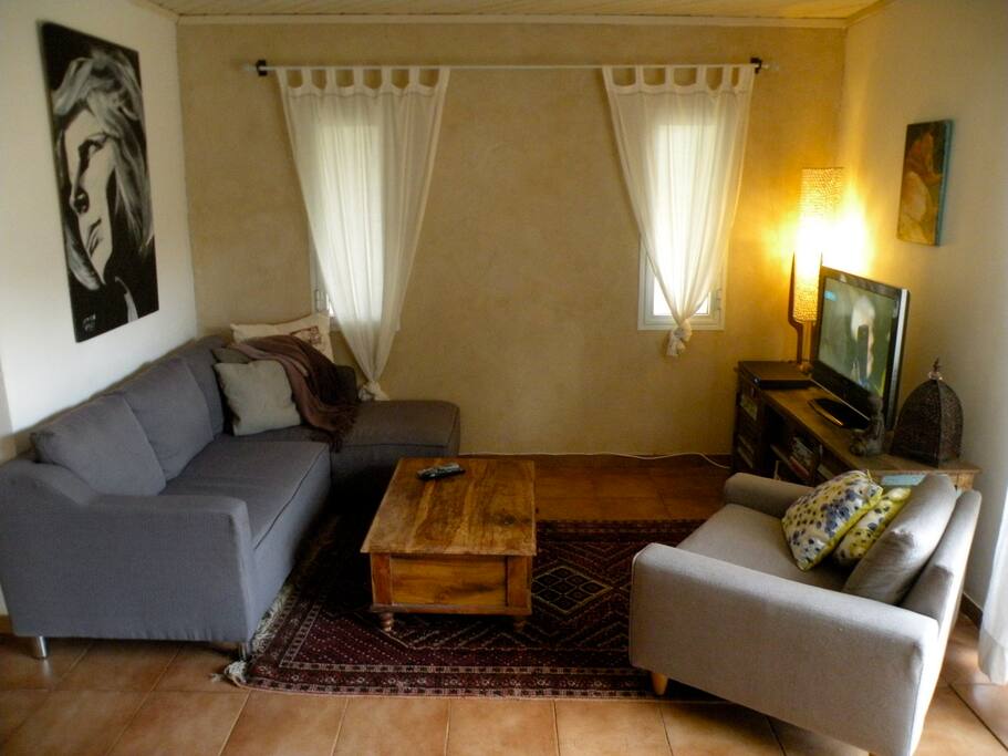 The living room has cable TV