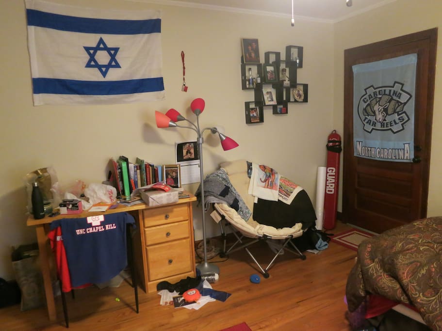 Personal desk and chair in room