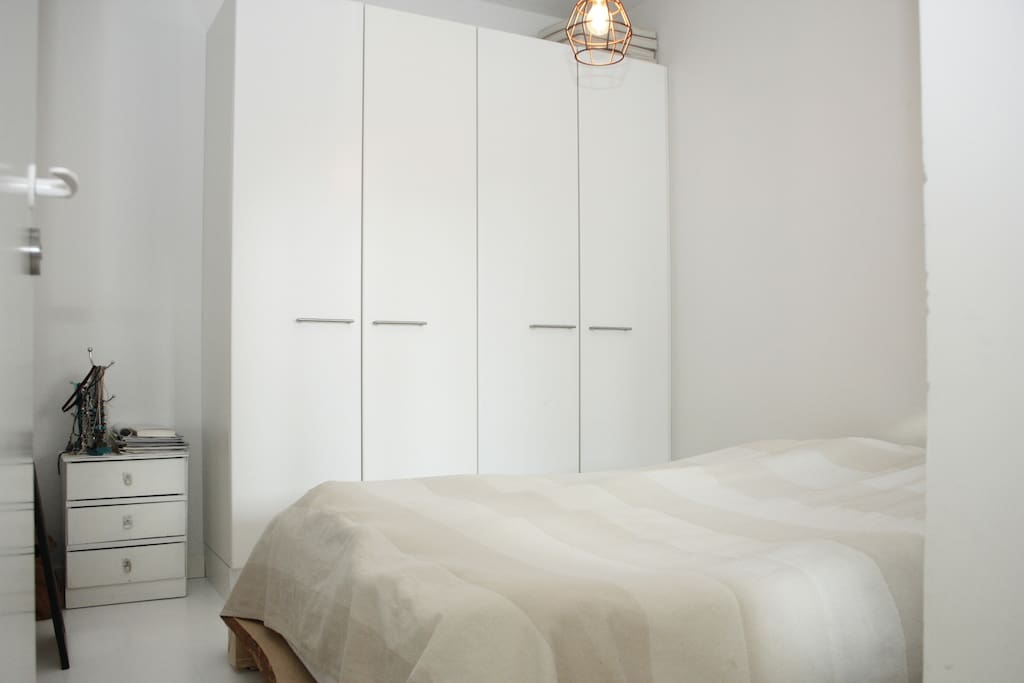 Master bedroom with a double bed