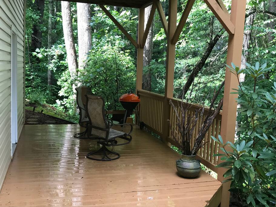 Covered deck area with seating to enjoy your morning coffee or evening cocktail.