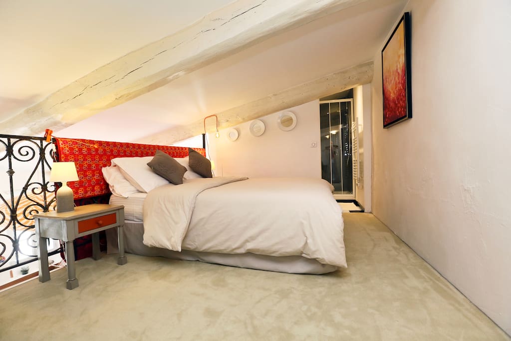 The bedroom and bathroom are located in the mezzanine.