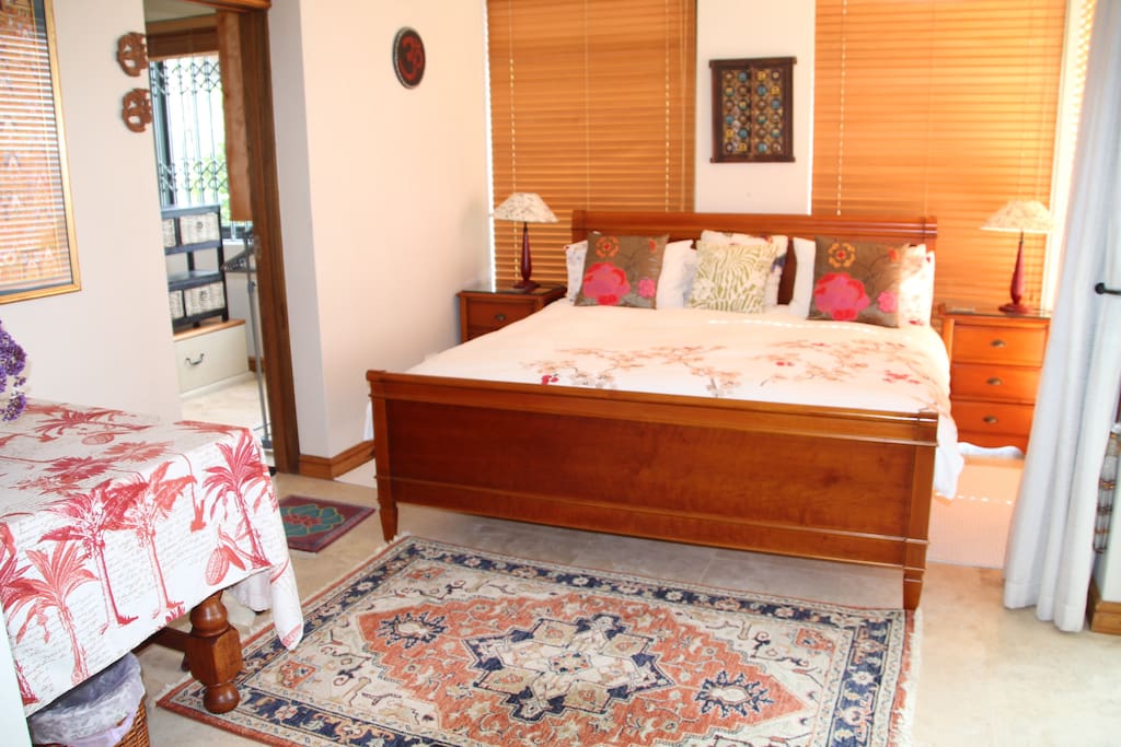 Suite3 beautiful space leading into previous photo veranda views of the bay from bed