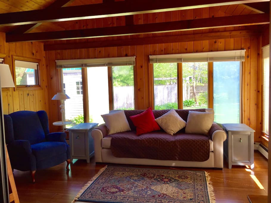 Sunroom with sleeper-sofa.