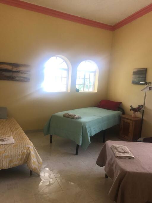 Room #6: this room sleeps three. It is bright and welcoming.