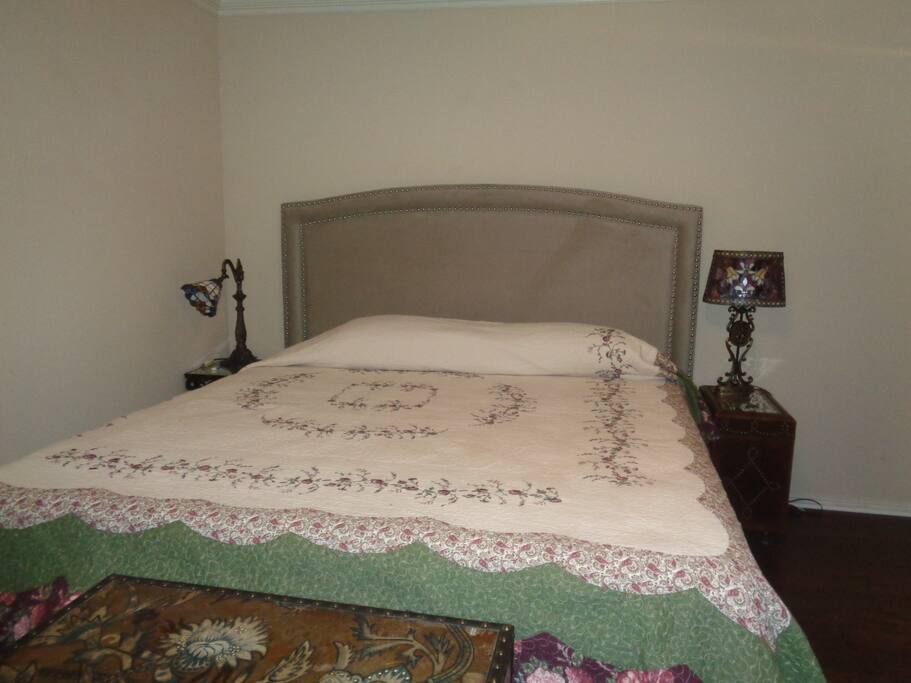 Room has a king sized bed.