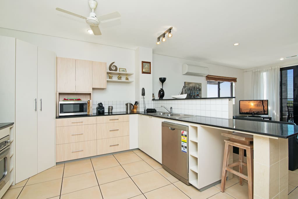 Fully equipped kitchen with dishwasher and coffee machine