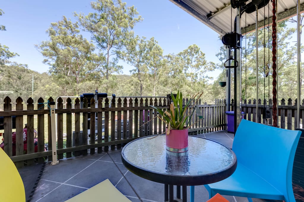 Gorgeous relaxing outdoor patio, overlooking your own little fenced yard, & beautiful natural bushland.