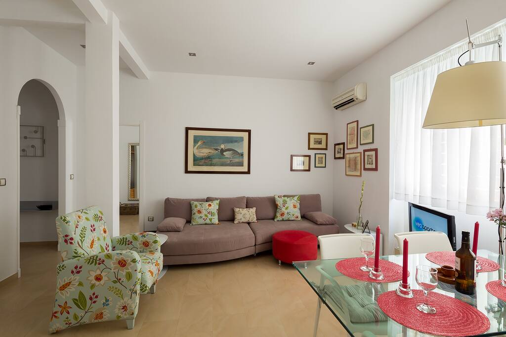 Living area. Next to the sofa is the access door to the bedroom.