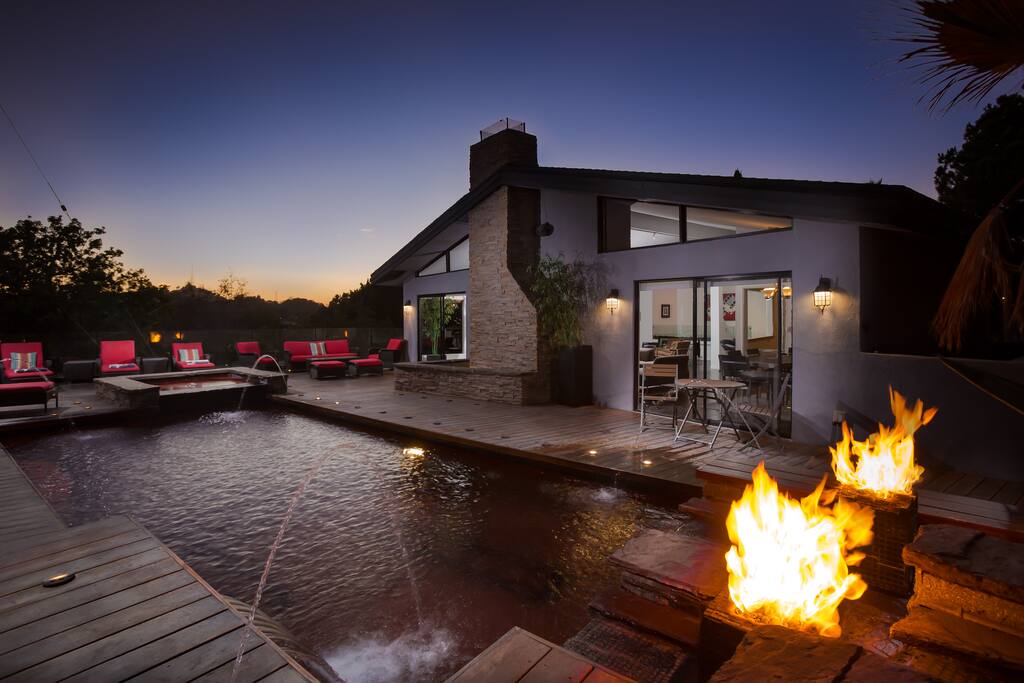 The pool area has 3 fire features, a waterfall and fountain