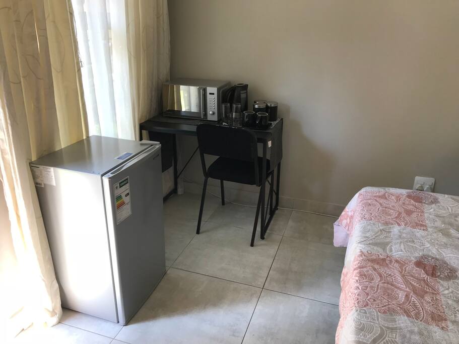 Fridge, microwave and coffee station