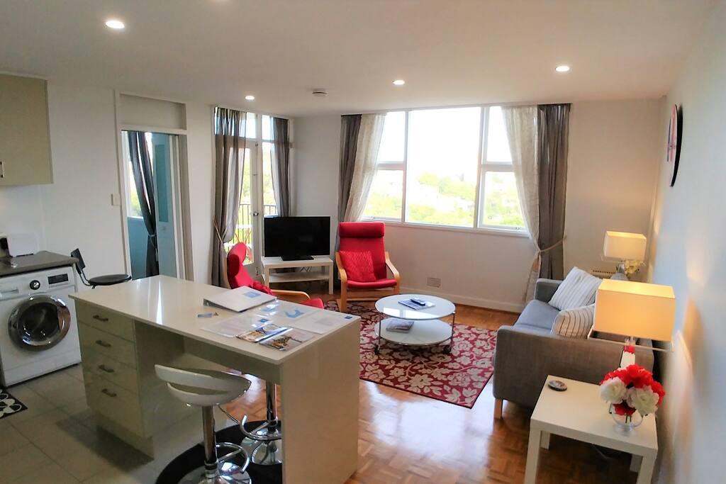 Spacious living room with plenty of comfortable seating