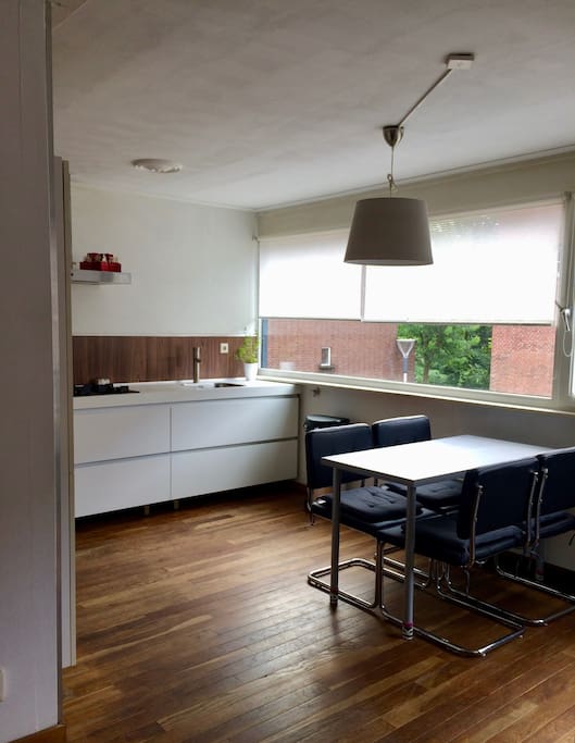 living room is connected to the kitchen