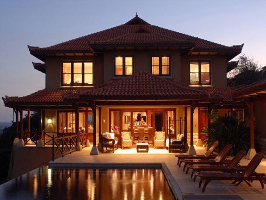 Another front-page shot of the flagship house during dusk.