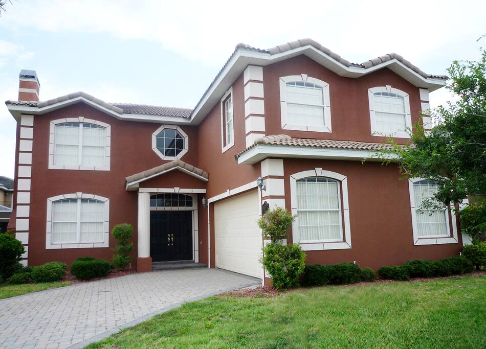 Our beautiful 6 bed/5 bath home with fully screened private pool