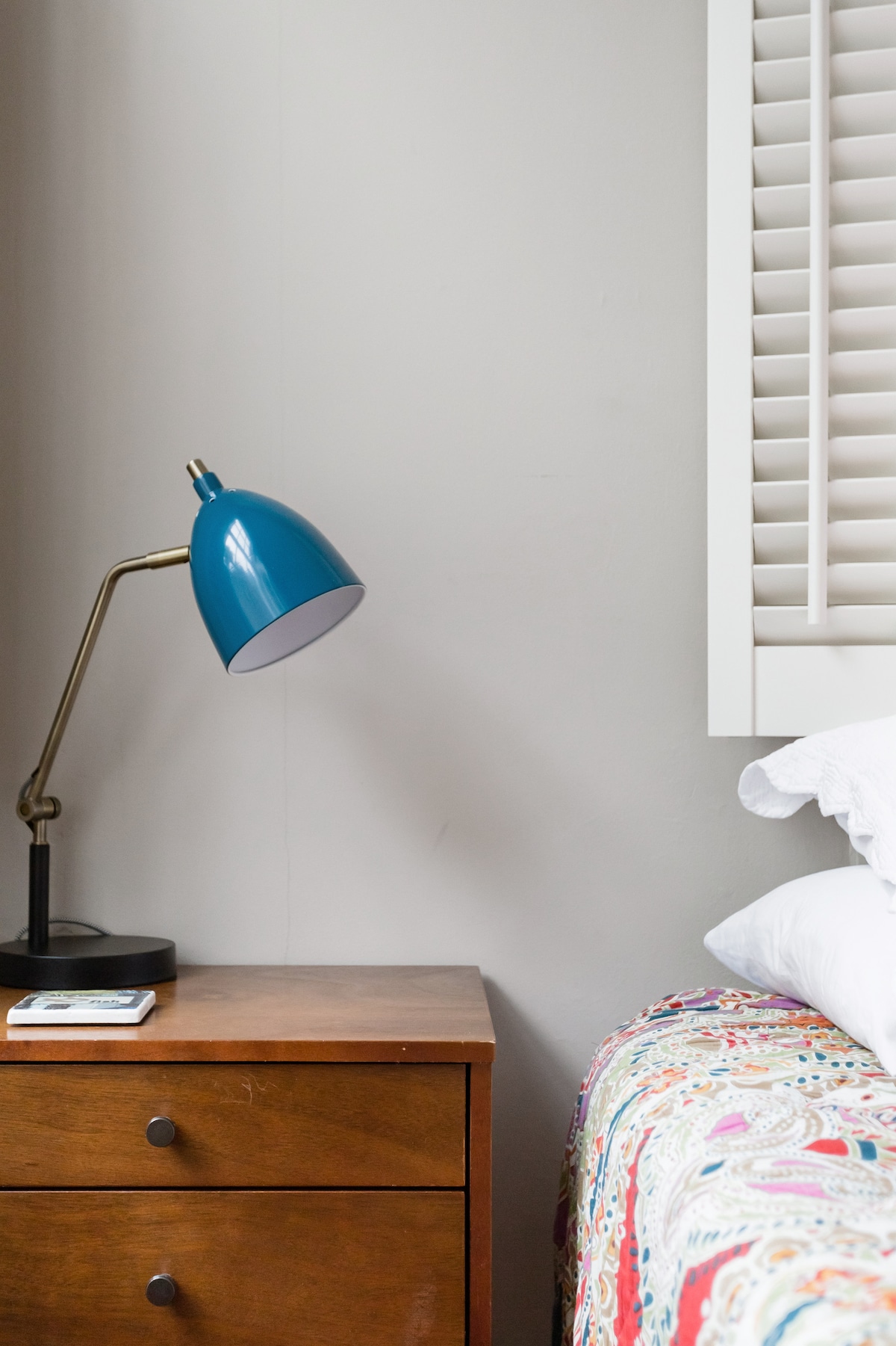 Secondary sleeping area with original windows to frame the historical charm of Charleston.
