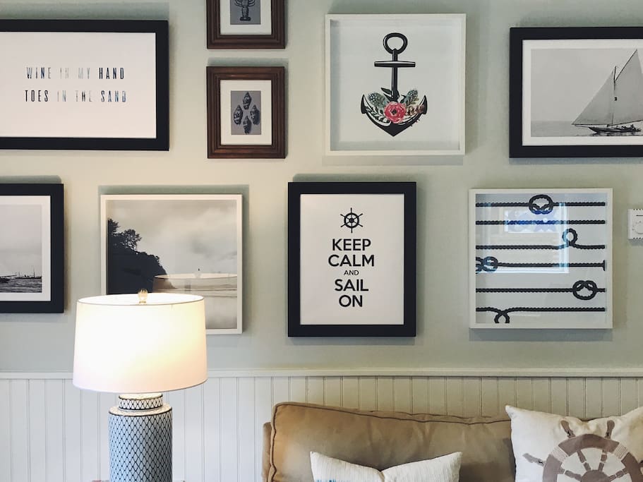 A detail of the nautical-inspired wall gallery.