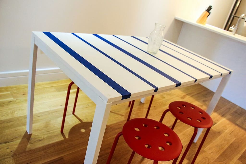Kitchen table seats four comfortably. Additional seating may be available upon request.