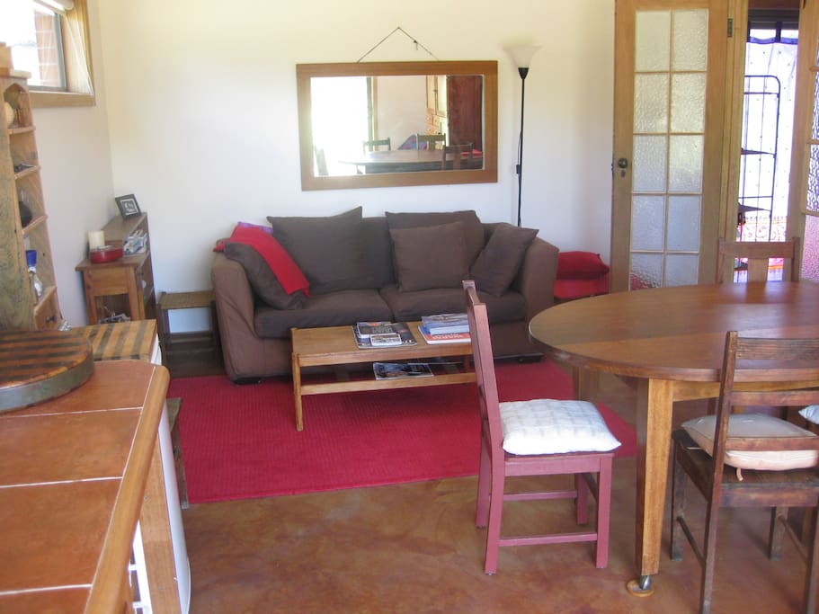 Living room & kitchen bar with all you need.