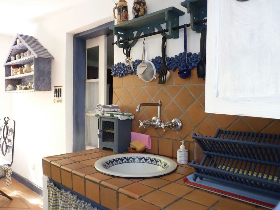Kitchen area and door leading to bathroom and bedroom