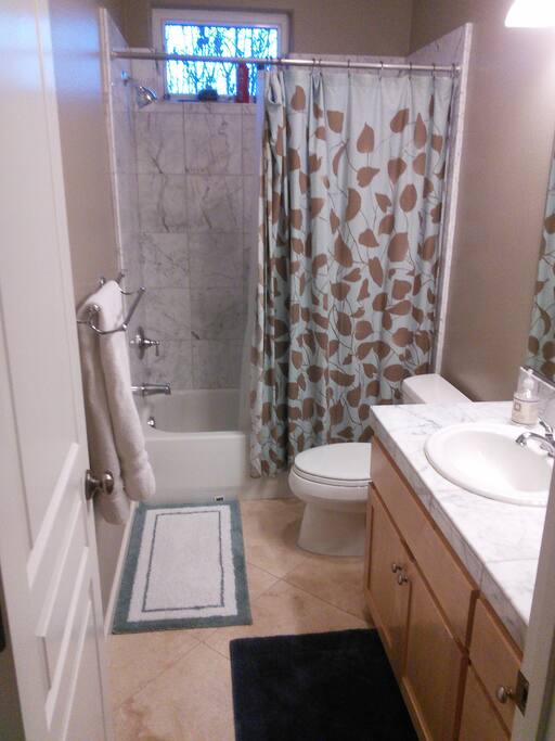 Full bath with amenities