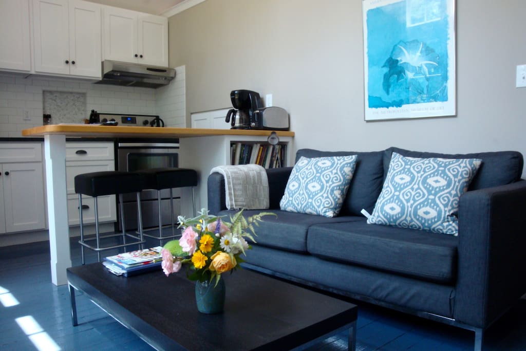 The living/kitchen area is small but cozy. It has a flat screen t.v. shared with the kitchen, a great space for relaxing at the end of the day.