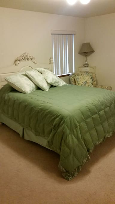 Super comfy queen size bed with large mirrored closet and private full bathroom
