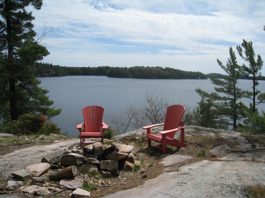Muskoka chairs by the firepit