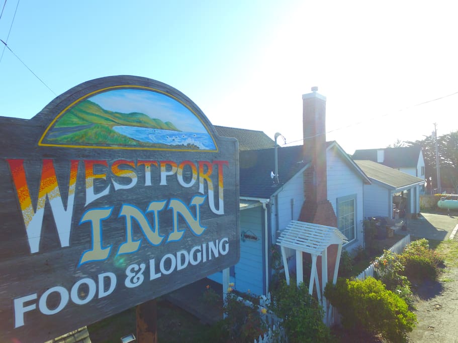 Westport Inn main office/house. Features a dinning table and lounge. Breakfast items are available in the main office.