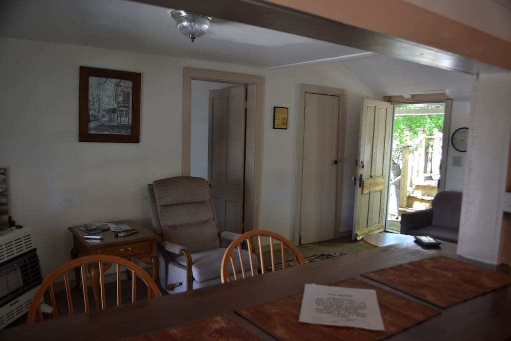 Living area and front door, which is actually at the back of the house